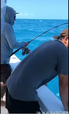 Florida workers compensation fishing charter surveillance evidence photograph 1